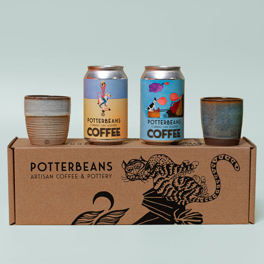 Gift box of coffee. Espresso cups and coffee beans