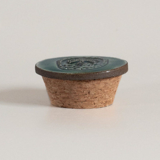 cork stopper for tins with a ceramic top