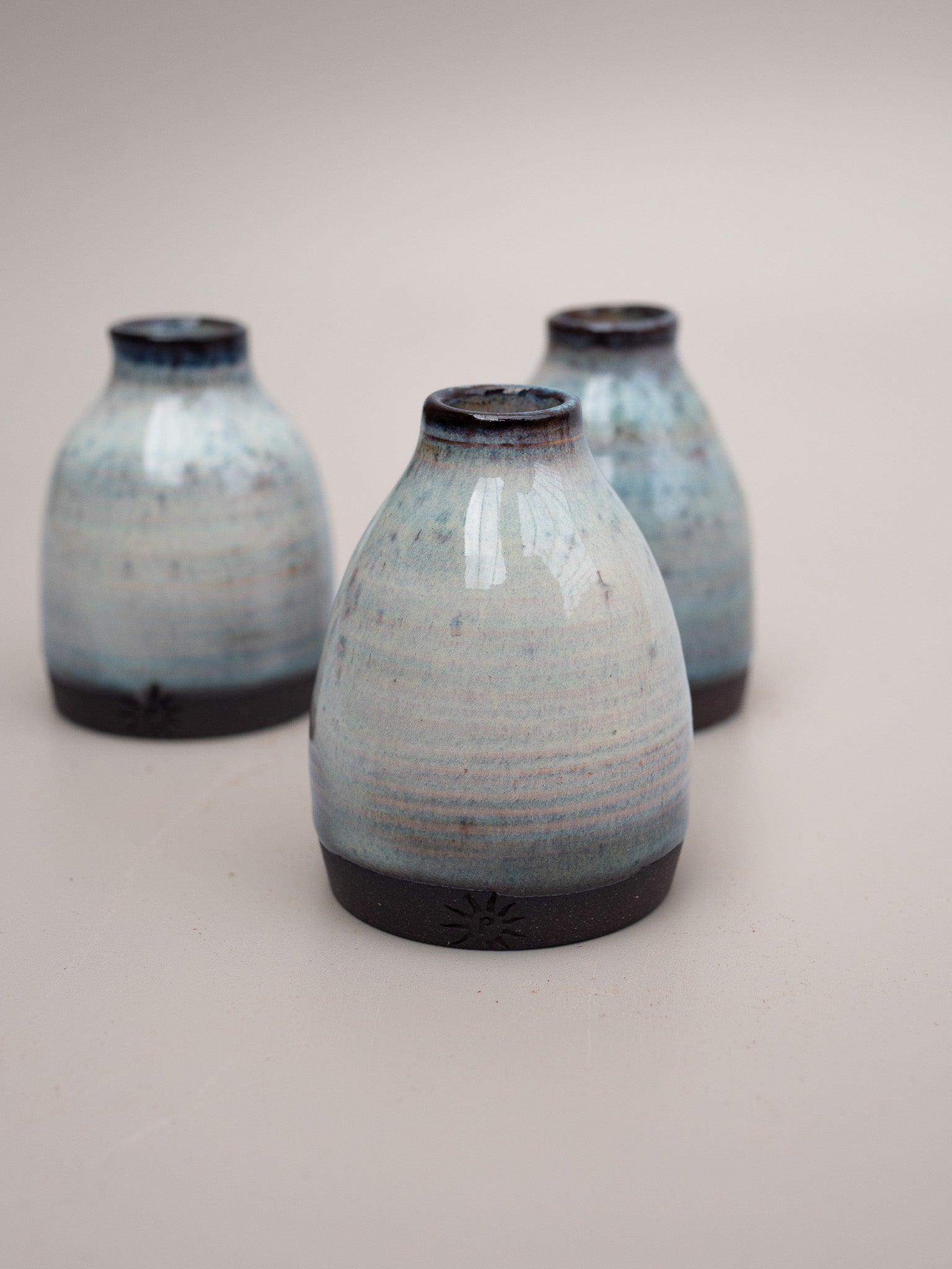 Small bud vases thrown in stoneware clay