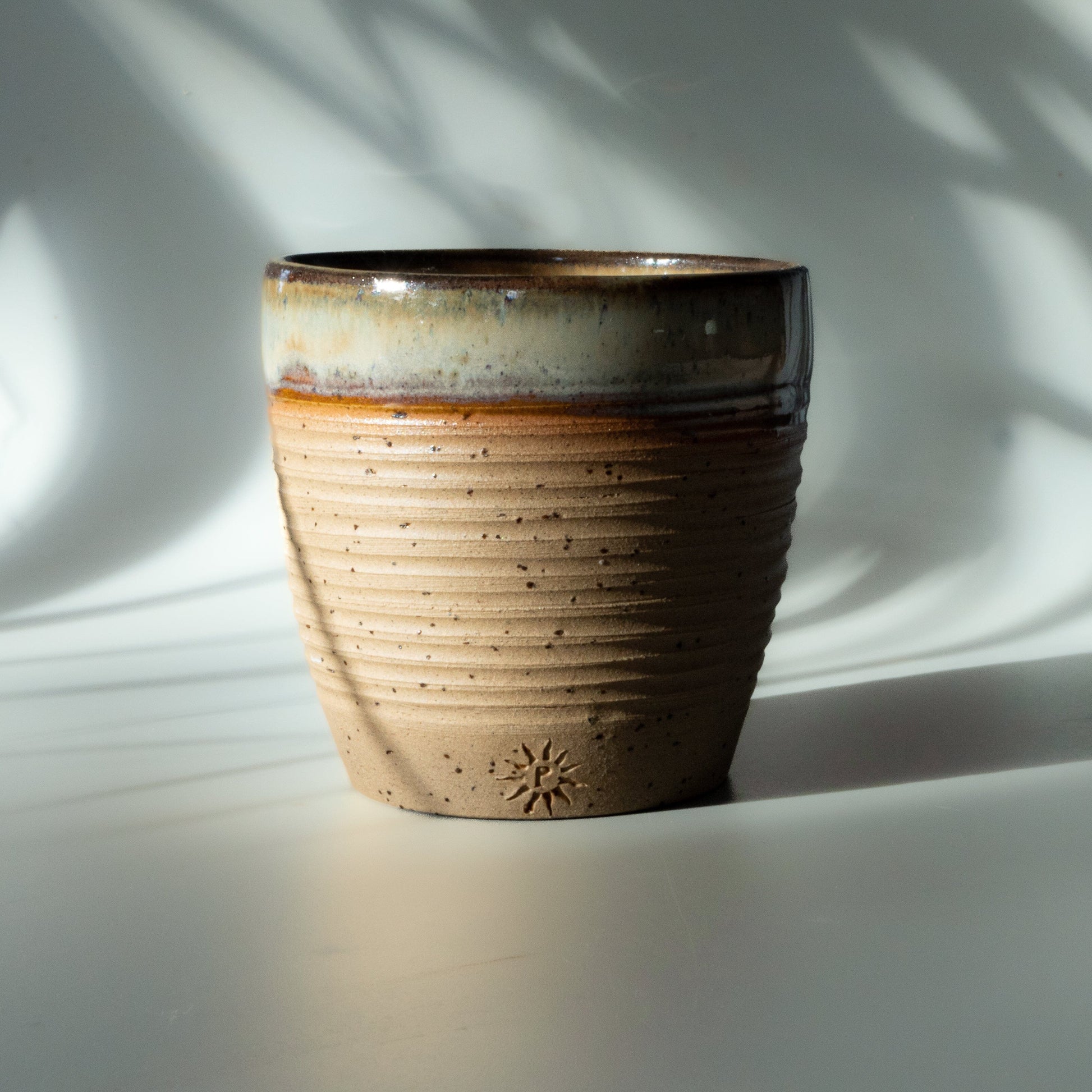 Toasted stoneware clay espresso cup. Hand thrown pottery.